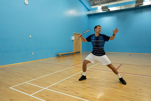 Forehand rear court badminton